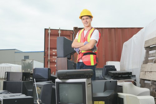 Workers sorting recyclable materials at a transfer station